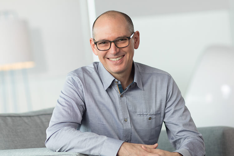 Chris Hyams, CEO at Indeed is smiling